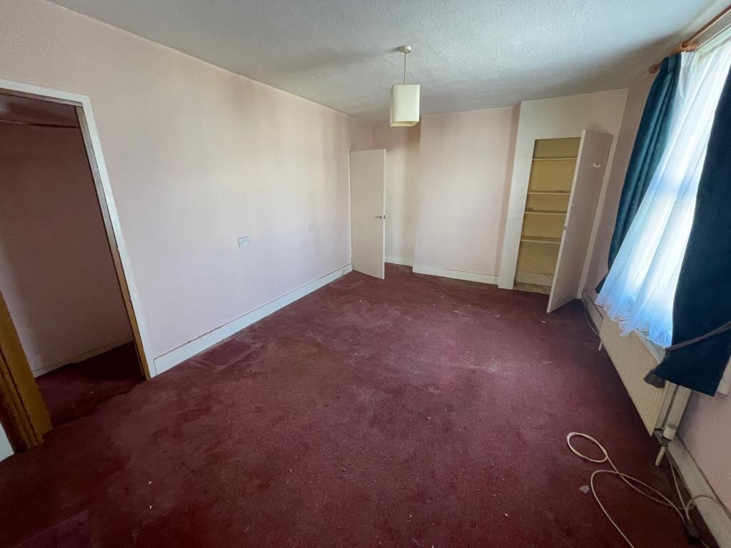 Lot: 2 - END-TERRACE HOUSE FOR IMPROVEMENT - first floor bedroom